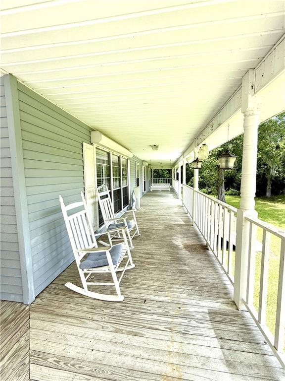7282 Barataria Blvd, Marrero, LA 70072 - view of wooden deck