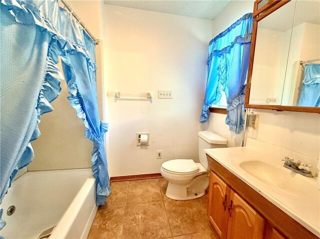 7282 Barataria Blvd, Marrero, LA 70072 - full bath with vanity, shower / bathtub combination with curtain, and tile patterned floors