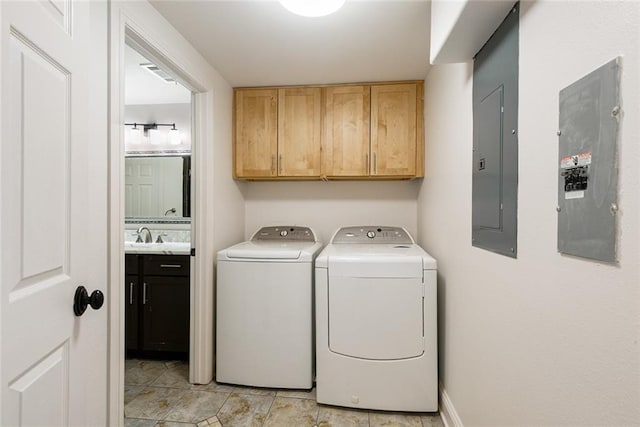 700 Crystal St, New Orleans, LA 70124 - laundry room with electric panel, cabinet space, and washer and dryer