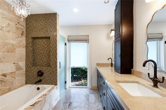 700 Crystal St, New Orleans, LA 70124 - full bathroom featuring double vanity, tiled shower / bath, and recessed lighting