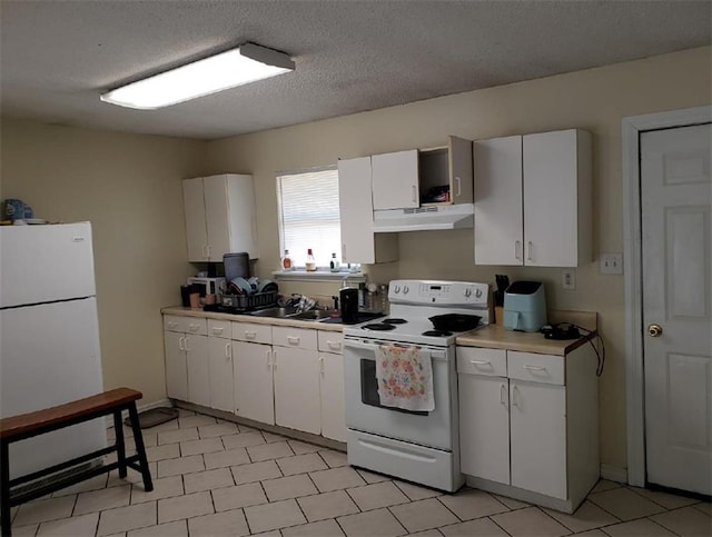 11539 Wendell Ln, Hammond, LA 70401 - kitchen featuring white appliances, under cabinet range hood, light countertops, white cabinetry, and a textured ceiling