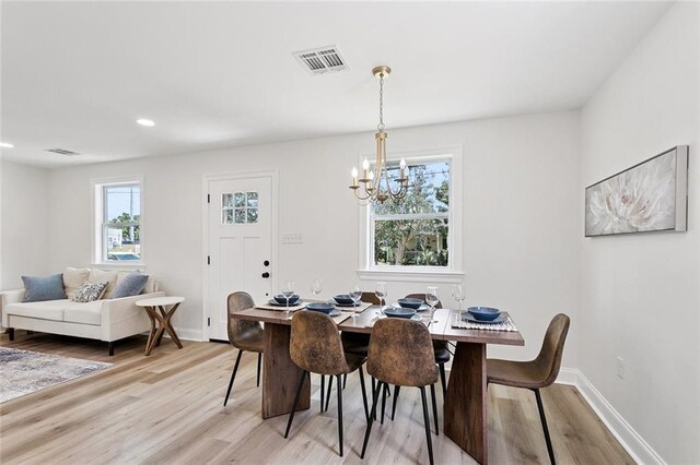 3009 Sundorn St, Jefferson, LA 70121 - dining area featuring a chandelier, light wood-type flooring, and recessed lighting