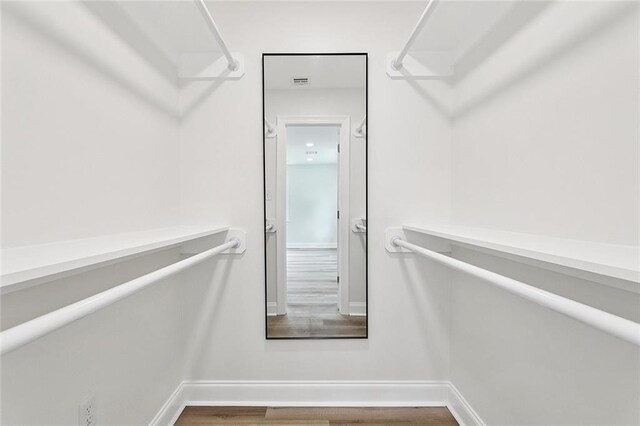 3009 Sundorn St, Jefferson, LA 70121 - walk in closet featuring wood finished floors