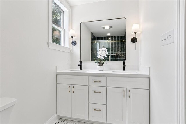 3009 Sundorn St, Jefferson, LA 70121 - bathroom with a tile shower and double vanity