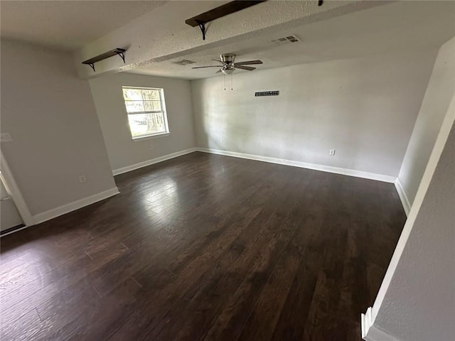1505 Saint Ann Pl, Slidell, LA 70460 - spare room with ceiling fan and dark wood finished floors