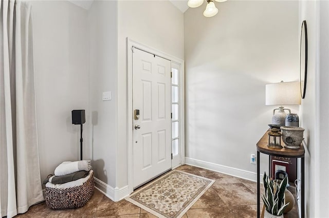 1580 Cherry Ridge Ct, Mandeville, LA 70448 - foyer entrance with baseboards and vaulted ceiling