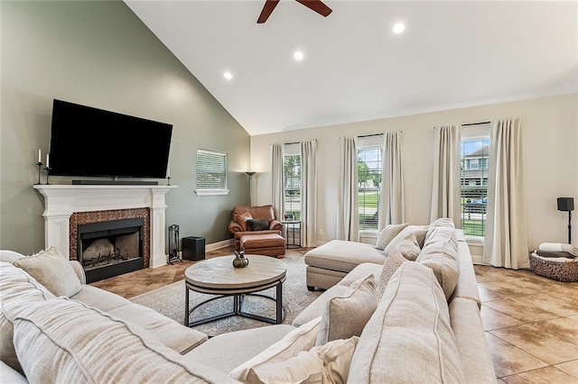 1580 Cherry Ridge Ct, Mandeville, LA 70448 - living room featuring ceiling fan, high vaulted ceiling, recessed lighting, light tile patterned floors, and a fireplace