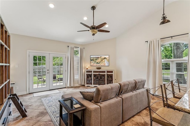 1580 Cherry Ridge Ct, Mandeville, LA 70448 - living room with a ceiling fan, vaulted ceiling, french doors, light tile patterned flooring, and recessed lighting