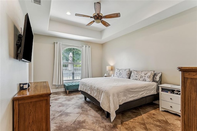 1580 Cherry Ridge Ct, Mandeville, LA 70448 - bedroom featuring a ceiling fan and a raised ceiling