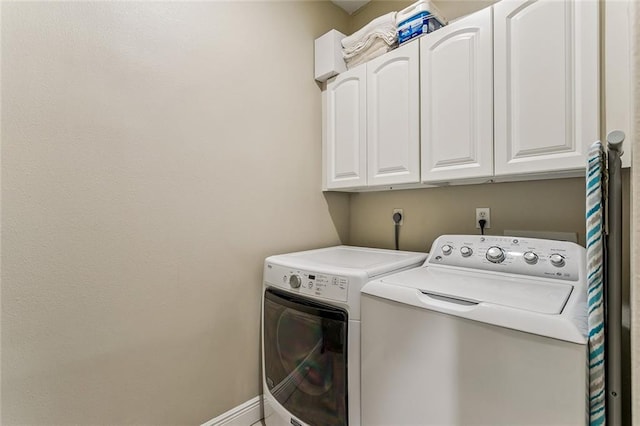1580 Cherry Ridge Ct, Mandeville, LA 70448 - washroom featuring washing machine and dryer and cabinet space