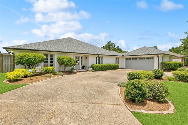 33 Rosedown Dr, Destrehan, LA 70047 - ranch-style home with driveway, a garage, and brick siding