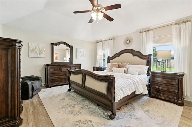 33 Rosedown Dr, Destrehan, LA 70047 - bedroom with light wood finished floors, multiple windows, lofted ceiling, and ceiling fan