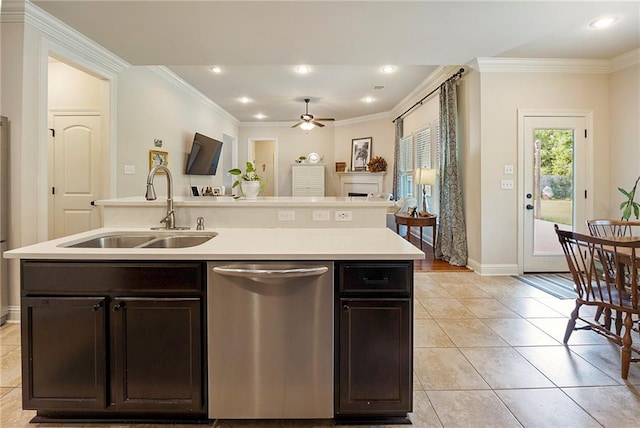 17509 Waterloo Dr, Baton Rouge, LA 70817 - kitchen featuring stainless steel dishwasher, ceiling fan, a center island with sink, dark brown cabinetry, and light tile patterned floors