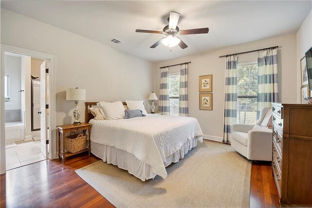17509 Waterloo Dr, Baton Rouge, LA 70817 - bedroom with wood finished floors, ceiling fan, and ensuite bathroom