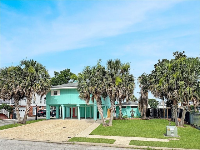 4230 Murano Rd, New Orleans, LA 70129 - beach home with a carport, driveway, and stairs