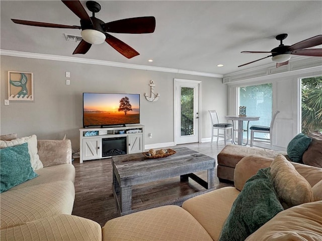 4230 Murano Rd, New Orleans, LA 70129 - living area with ceiling fan, ornamental molding, recessed lighting, and wood finished floors