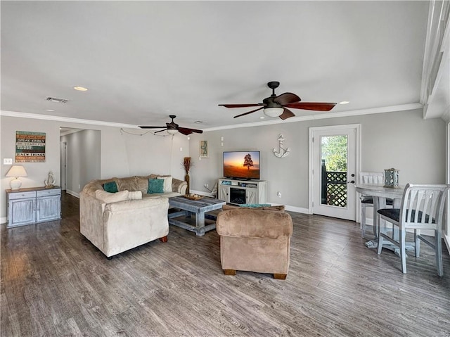 4230 Murano Rd, New Orleans, LA 70129 - living area with a ceiling fan, wood finished floors, recessed lighting, and ornamental molding