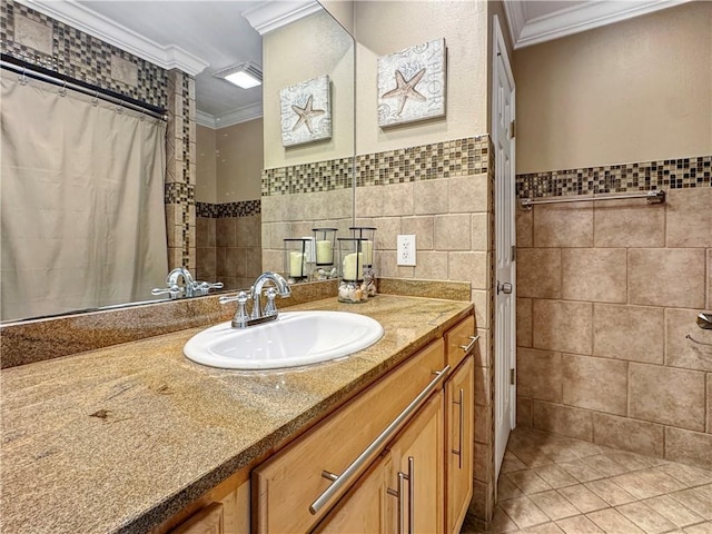 4230 Murano Rd, New Orleans, LA 70129 - bathroom with crown molding, tile walls, vanity, tile patterned flooring, and curtained shower