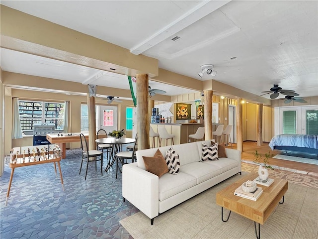 4230 Murano Rd, New Orleans, LA 70129 - living area with a ceiling fan and beam ceiling