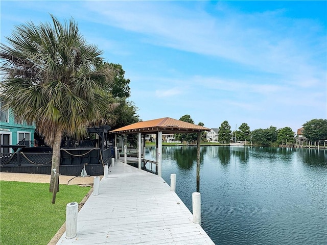 4230 Murano Rd, New Orleans, LA 70129 - dock area with a water view and a lawn