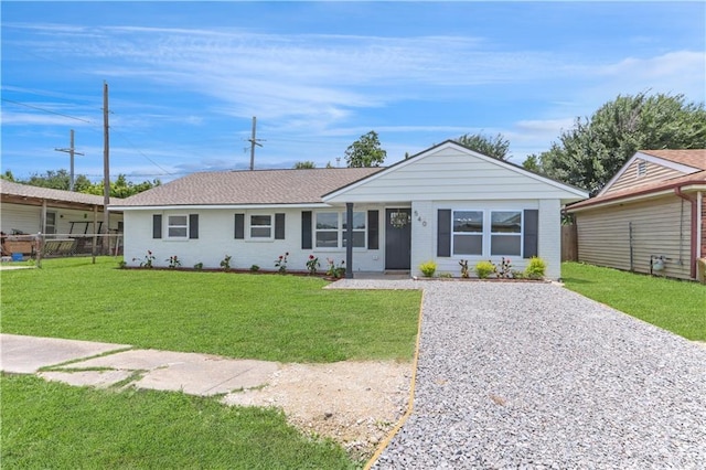 540 Ruth Dr, Westwego, LA 70094 - ranch-style house featuring brick siding and gravel driveway