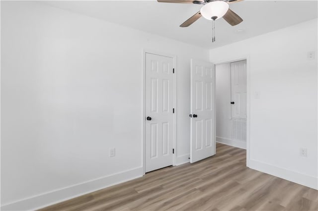 540 Ruth Dr, Westwego, LA 70094 - unfurnished bedroom with light wood-style floors, a ceiling fan, and a closet