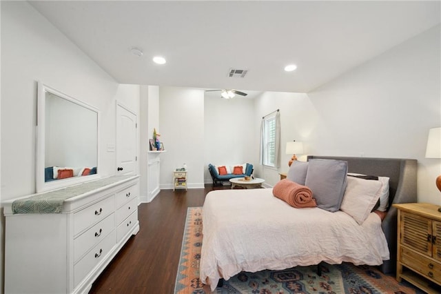 1131 N Roman St, New Orleans, LA 70116 - bedroom with dark wood-style flooring and recessed lighting