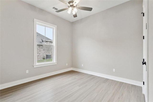 72701 Robindale Dr, Covington, LA 70435 - spare room with light wood-style floors and ceiling fan