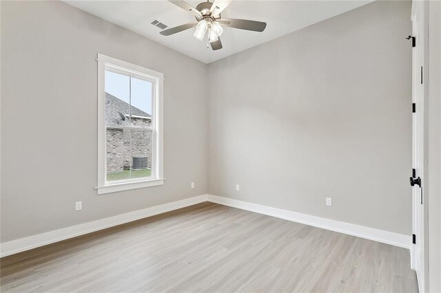 72701 Robindale Dr, Covington, LA 70435 - spare room with light wood-style floors and ceiling fan