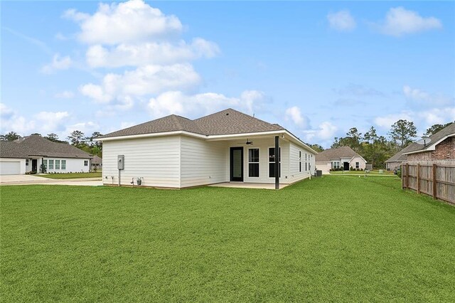 72701 Robindale Dr, Covington, LA 70435 - rear view of property featuring ceiling fan, a patio, driveway, and a shingled roof