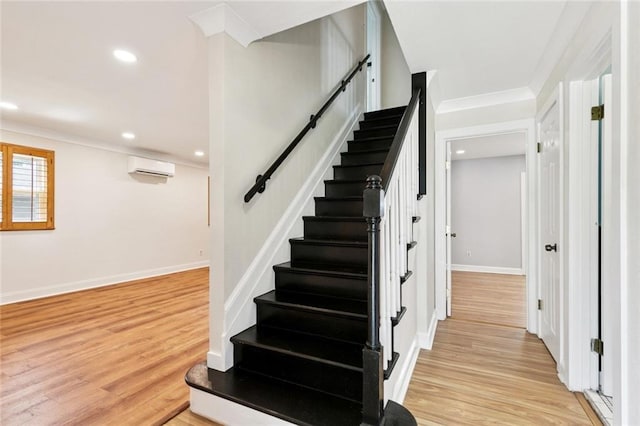 7032 Glenn St, Metairie, LA 70003 - staircase with wood finished floors, a wall mounted air conditioner, recessed lighting, and crown molding