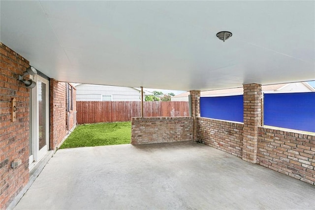 7032 Glenn St, Metairie, LA 70003 - fenced backyard featuring a patio area