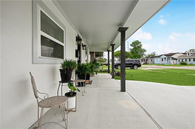 713 N Lester Ave, Metairie, LA 70003 - porch with a yard and a residential view