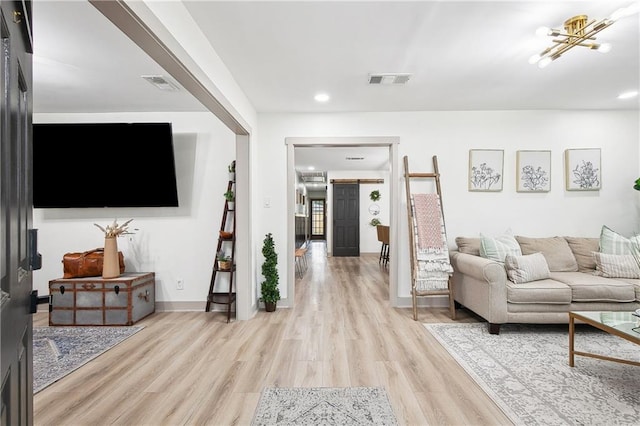 713 N Lester Ave, Metairie, LA 70003 - living room featuring light wood-style floors and recessed lighting