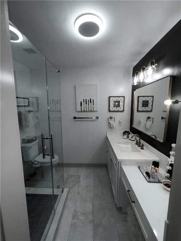 713 N Lester Ave, Metairie, LA 70003 - full bathroom featuring vanity and a shower stall