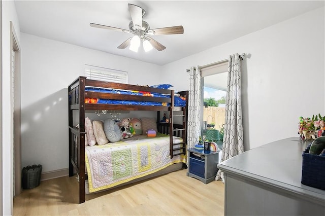 713 N Lester Ave, Metairie, LA 70003 - bedroom with wood finished floors and ceiling fan