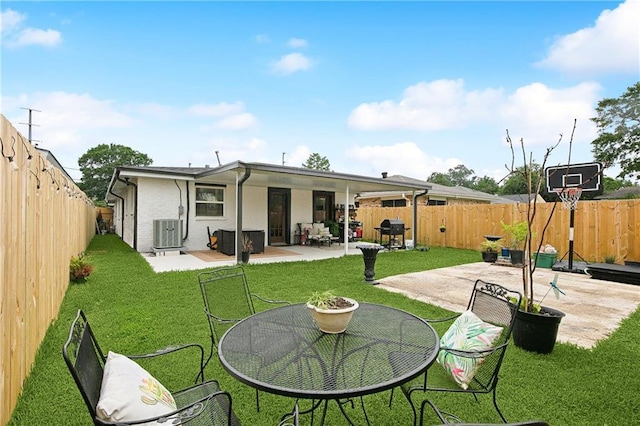 713 N Lester Ave, Metairie, LA 70003 - rear view of house with a patio and a fenced backyard