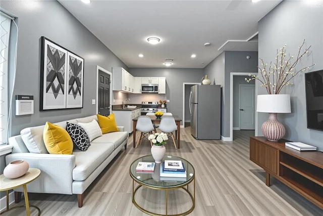 272 W Harrison St, Baton Rouge, LA 70802 - living room featuring light wood finished floors and recessed lighting