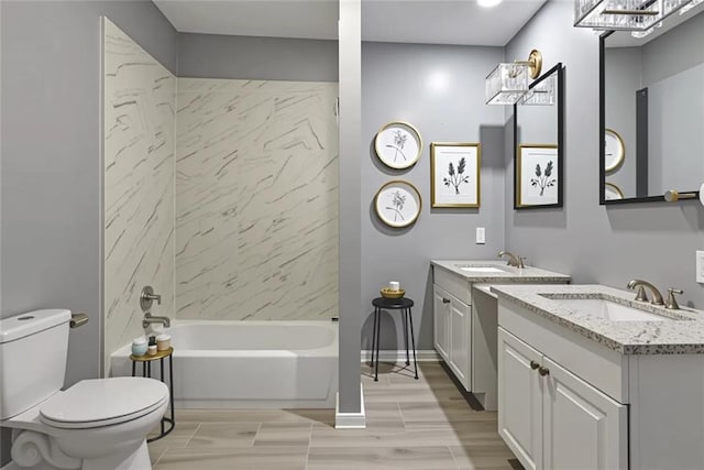 272 W Harrison St, Baton Rouge, LA 70802 - full bathroom featuring two vanities and bathtub / shower combination