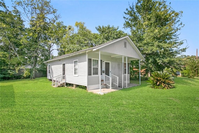 272 W Harrison St, Baton Rouge, LA 70802 - view of side of property with entry steps and a yard
