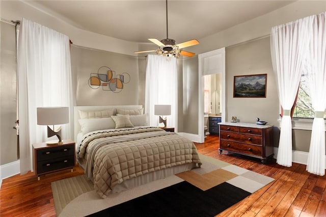202 S Pierce St, New Orleans, LA 70119 - bedroom featuring wood-type flooring, ceiling fan, and ensuite bathroom
