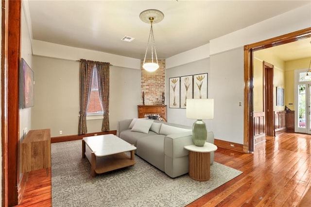 202 S Pierce St, New Orleans, LA 70119 - living room with wood-type flooring and baseboards