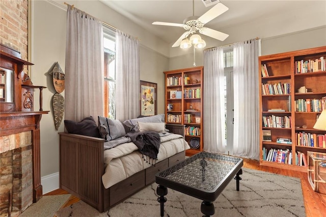 202 S Pierce St, New Orleans, LA 70119 - living area with wood finished floors and ceiling fan