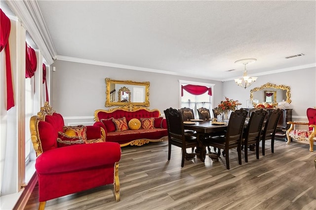 1111 Artesa Dr, Marrero, LA 70072 - dining room featuring ornamental molding, a chandelier, and wood finished floors