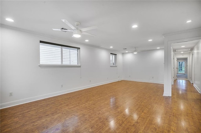5538 Bellaire Dr, New Orleans, LA 70124 - unfurnished room with ornamental molding, a ceiling fan, attic access, recessed lighting, and wood finished floors