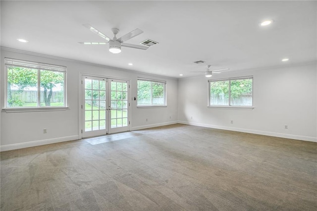 5538 Bellaire Dr, New Orleans, LA 70124 - spare room with ornamental molding, a ceiling fan, recessed lighting, carpet flooring, and french doors