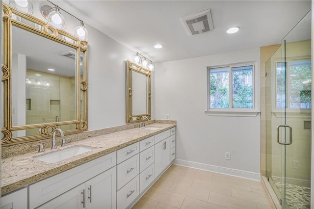 5538 Bellaire Dr, New Orleans, LA 70124 - full bathroom with double vanity, a stall shower, tile patterned floors, and recessed lighting