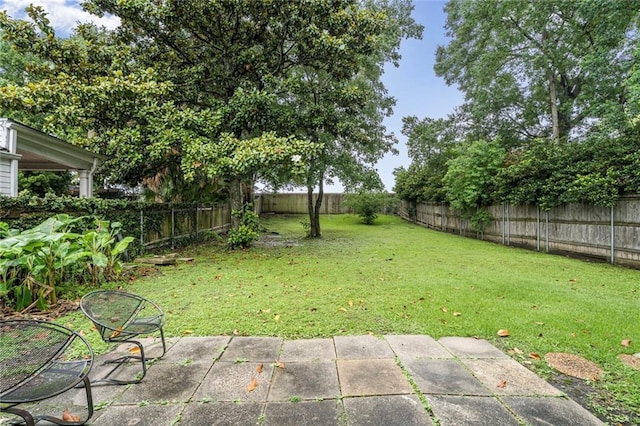 5538 Bellaire Dr, New Orleans, LA 70124 - fenced backyard with a patio