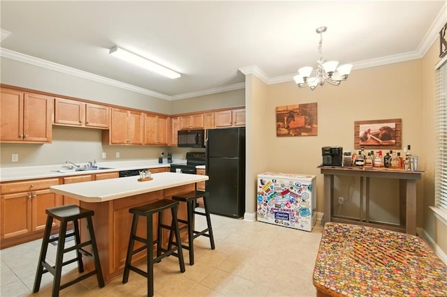 5191 Arlington Ct, Baton Rouge, LA 70820 - kitchen featuring black appliances, ornamental molding, a chandelier, light countertops, and a kitchen breakfast bar