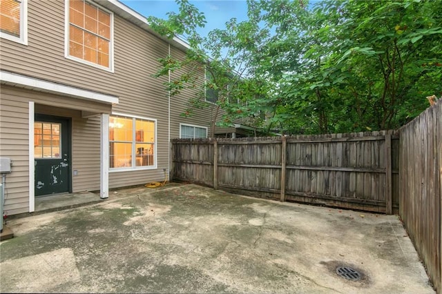 5191 Arlington Ct, Baton Rouge, LA 70820 - fenced backyard with a patio area